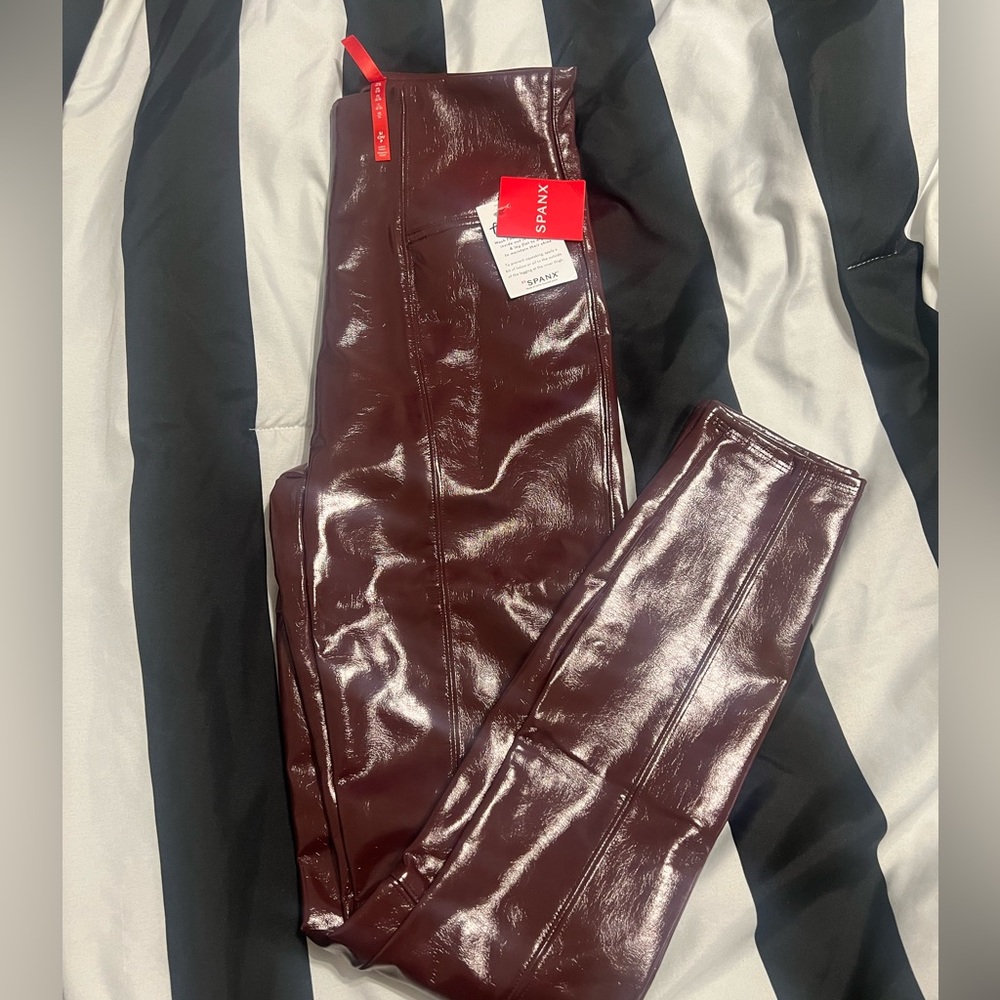 Spanx Faux Patent Leather Leggings in color Ruby size small NWT